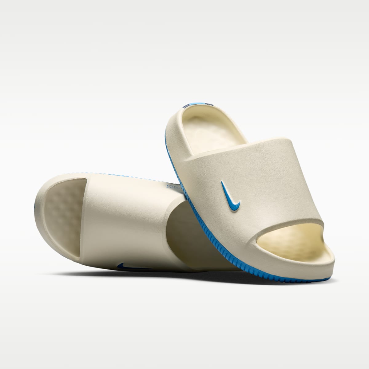 Nike Calm (Tennessee Titans) Men's NFL Slides - Sail/College Navy/Coast - Image 1