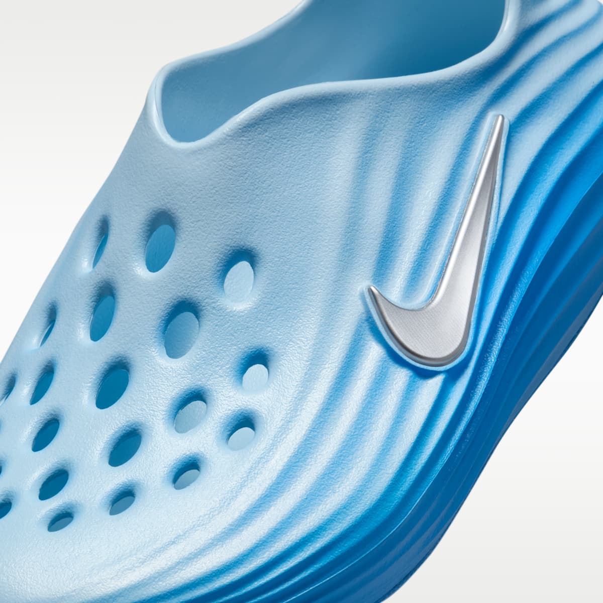 Nike ReactX Rejuven8 Big Kids' Shoes - Glacier Blue/University Blue/Metallic Silver - Image 7