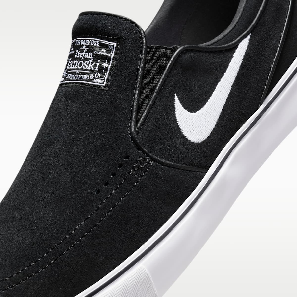 Nike SB Janoski+ Slip Skate Shoes - Black/Black/Black/White - Image 7
